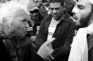 Nawal El Saadawi defending women's rights to pray alongside men in mosques, Tahrir Square. Photo: Al Jazeera.